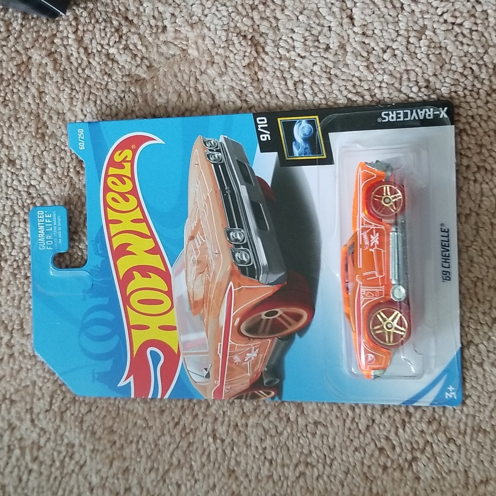 Collectable mechanix hot wheels gloves and car
